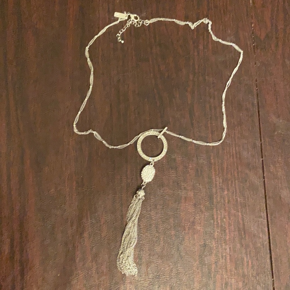 Beautiful NWB  silver necklace with a tassel by INC